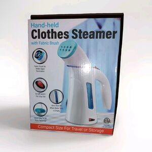 Hand held clothes steamer with brush. Opened box, unused steamer